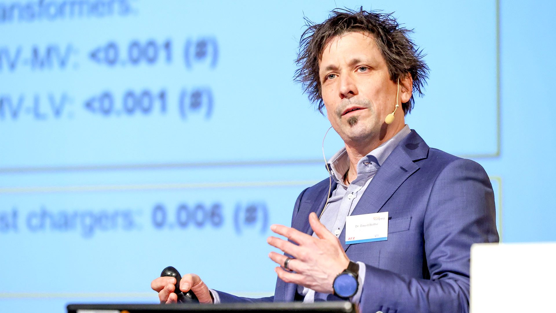 Speaker during his presentation on stage.